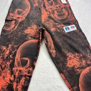 PacSun Orange and Black Skull Print Pants